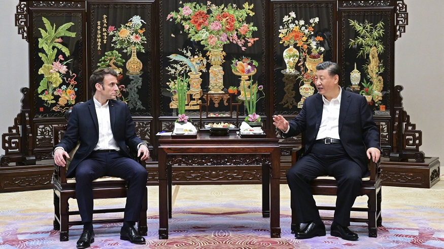 习近平同法国总统马克龙在广州非正式会晤